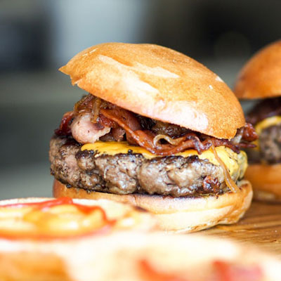 three bacon cheese burgers
