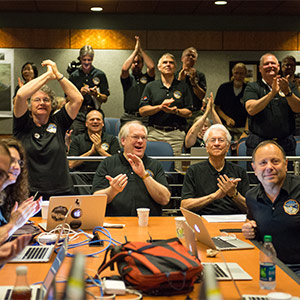 Part of the New Horizons team celebrating the spacecraft's flyby of Pluto