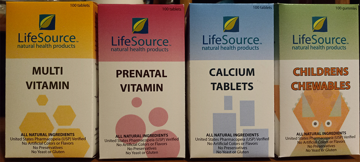 Rectangular boxes standing verically in a row, one has multivitamins(is decorated with hexagons), one is prenatal vitamins(is decorated with circles), one is calcium tablets(is decorated with rectangles), and one has children chewables(is decorated with dinosaurs)